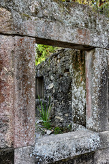 Naklejka premium Old ruins of stone farm house built by slaves in the 18th century in Minas Gerais, Brazil.