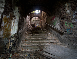 old abandoned fort in belgium, decaying stairs