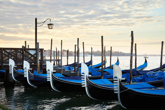 Gondolas in Grand Canal in the early morning in Venice, Italy