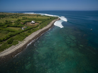 leaky peak perfection left hander cobblestone surfers drone aerial view sumbawa boat drone