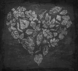 Banner with a print of fallen autumn leaves. Leaves in the shape of a heart on a chalkboard background. Vector autumn grunge card.