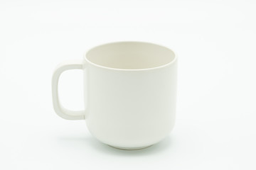 White coffee mug located in the middle of the picture. Has a white background As a raw material of the media. with copy space.