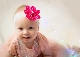 portrait of a girl with a red bow on a white background.