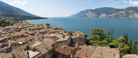 Panoramic view of Lake Garda and the village of Malcesine, Italy.
Lake Garda and its surroundings are a holiday area appreciated by many European tourists.