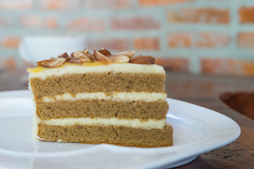Almond in bakery on plate and wall background,