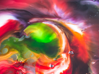 Abstract background, various pigments and dyes create a rich texture, blurred color background,