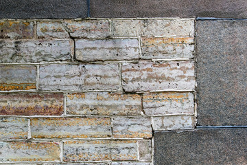 Wall of stone blocks of different sizes