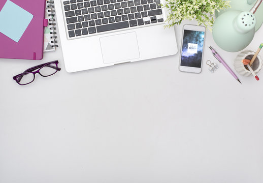 Smartphone on White Desk Mockup