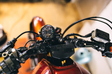 Fototapeta na wymiar Close up details of speedometer on custom made motorcycle.