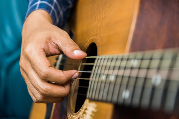 Fototapeta premium Close up of guitar player