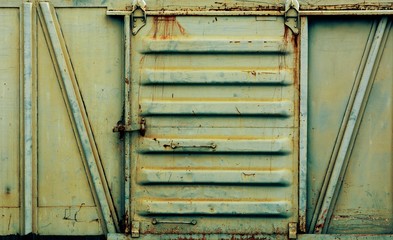 metal door of old and rusty bogie train