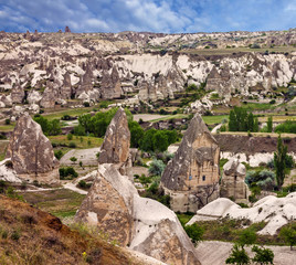 Fototapeta na wymiar Mountain landscape panoramic view. Cappadocia, Turkey. Goreme national park.