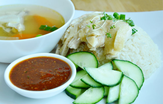 Hainanese chicken rice or steamed chicken and white rice (Thai name is Khao Man Kai).
Thai style chicken menu with rice.