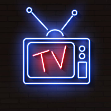 Old Neon TV With Antenna On Brick Wall