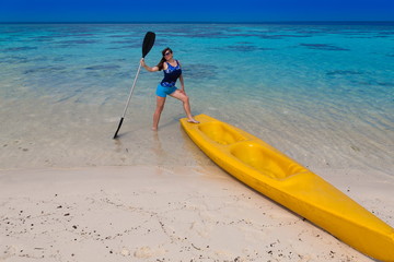 Maldives,  woman in canoe