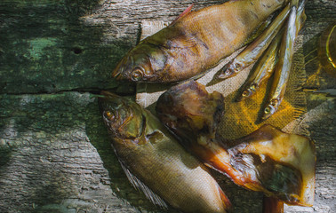 fish snacks to beer on wooden background