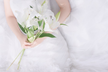beautiful bride hold white flower