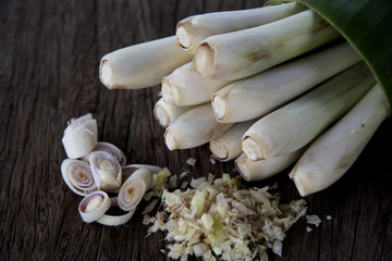 fresh spring onions on wooden table