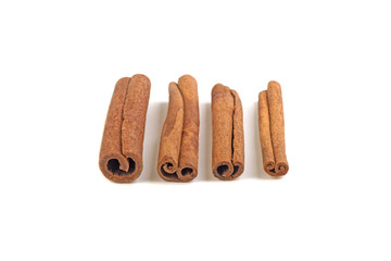 cinnamon sticks on white background