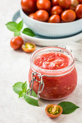 Tomato sauce  in a jar. Selective focus, space for text.