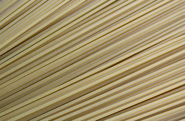 the texture of many stripes is diagonally light brown