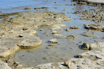 Afytos beach in Greece, rocks and blue sea