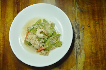 stir fried zucchini with egg topping shrimp on dish