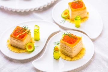 Tartlets with red caviar