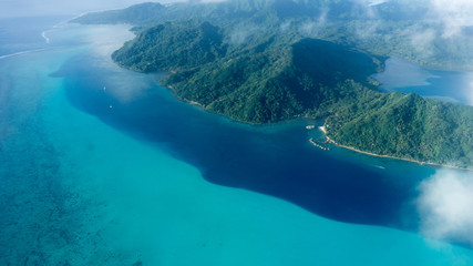 Flying over Huahine Blue Lagoon In French Polynesia - obrazy, fototapety, plakaty