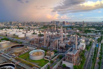 Aerial view of twilight of oil refinery ,Shot from drone of Oil refinery and Petrochemical plant at...