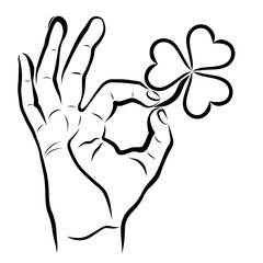 Clover with three leaves in hand showing OK sign