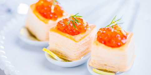 Tartlets with red caviar