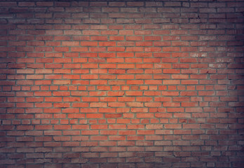 Fototapeta na wymiar brick texture. An old brick wall. Background. A day in the city.