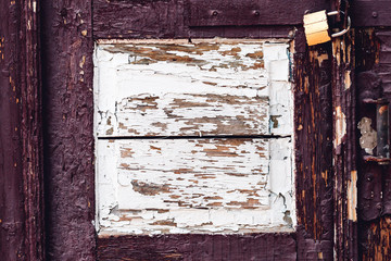 old wooden door with a lock.