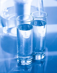 Drink. Water glass, filter, white background