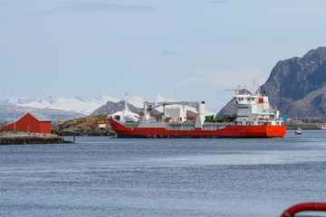 Cargo ship MS Kristian With on a trip through the Bronnoy Strait in Northern Norway