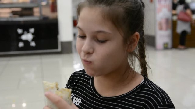 A Beautiful Girl Eating A Burrito, Close Up