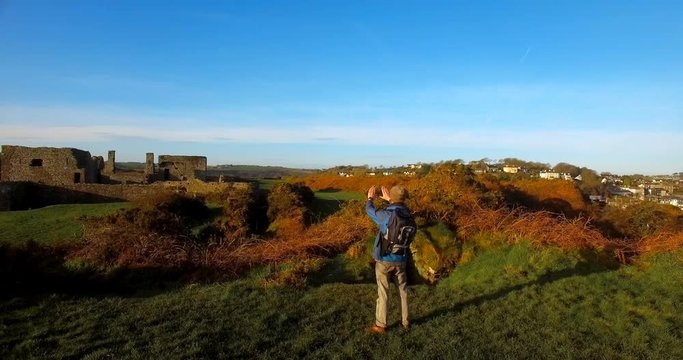 Male hiker hiking in countryside 4k