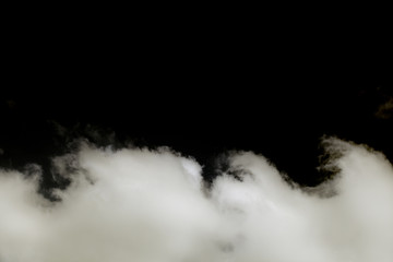 Isolated clouds over black.