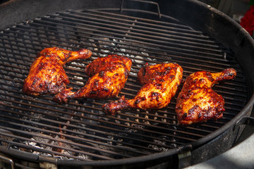 Happy Chicken on the grill with a warm environment