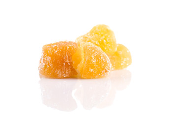 heap of sweat Candied ginger isolated on white