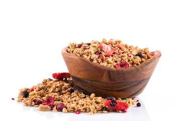 Muesli oat cereals close up background with dry fruits
