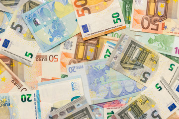 Obraz na płótnie Canvas Background from euro banknotes of different denominations. The concept of wealth and luxury