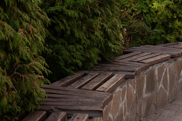 Bench made of wood and stone