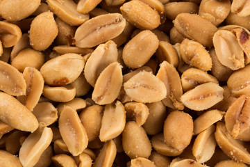 large amount of peeled salted peanuts