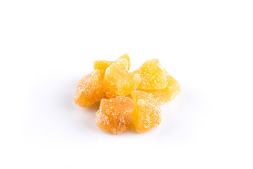 heap of sweat Candied ginger isolated on white