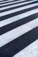 White and black asphalt at a street crossing