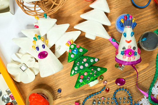 Handmade decorations for new year and other holidays. Artwork workplace with creative accessories.
