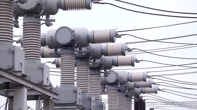 Transformer substation. High-voltage SF6 circuit breaker. Circuit breaker high voltage.  Part of high-voltage substation with switches and disconnectors.