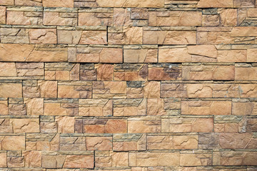 the texture of the stone tiles on the wall